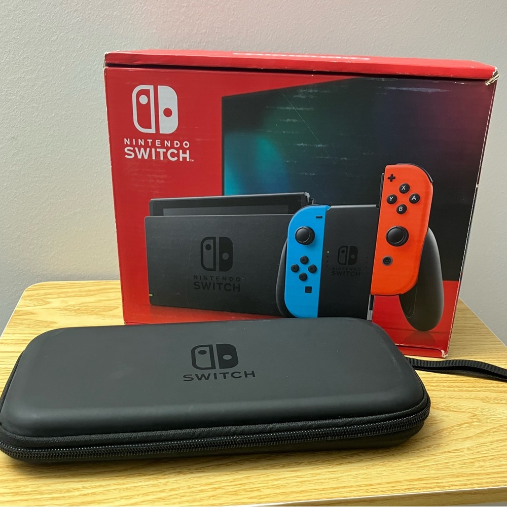 Nintendo Switch with Neon Blue & Neon Red Joy-Con and Black Carry Case